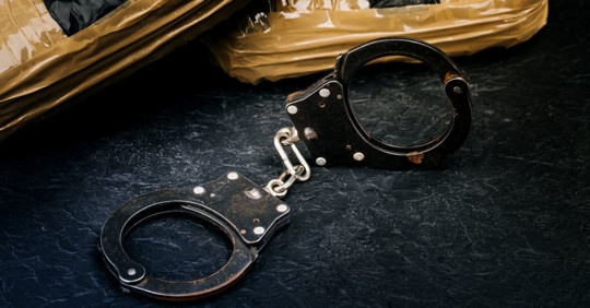 packages and handcuffs
